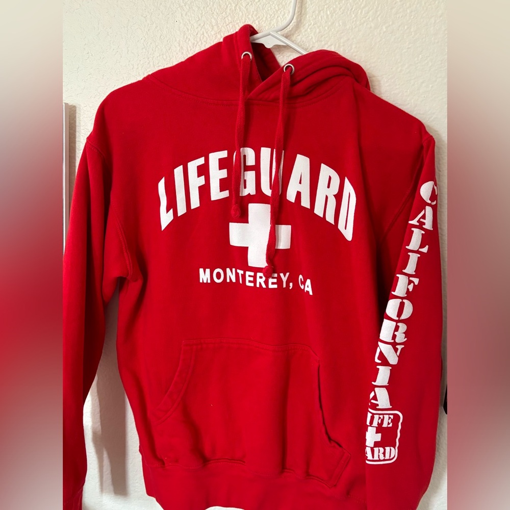 lifeguard hoodie, color is red, size small, worn once perfect condition